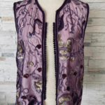 Gilet en dentelle brodée et perlée